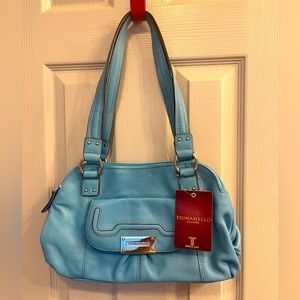 Tignanello Light Blue Purse. New. Has the credit card holder with it.